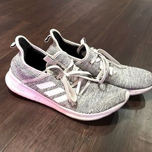 Black and white speckled Adidas shoes. Women’s size 8.
